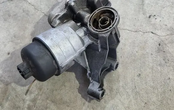 Jeep Compass Oil filter mounting bracket 55236756