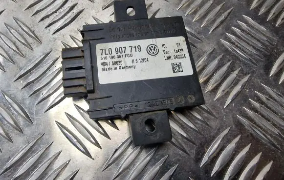 Volkswagen Touareg I Alarm control unit/module 7L0907719