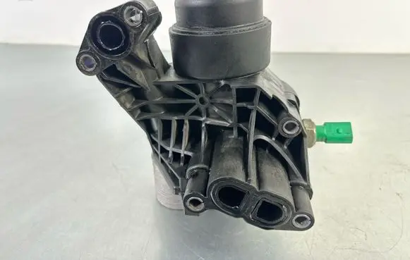 Volkswagen Tiguan Oil filter mounting bracket 03N117021