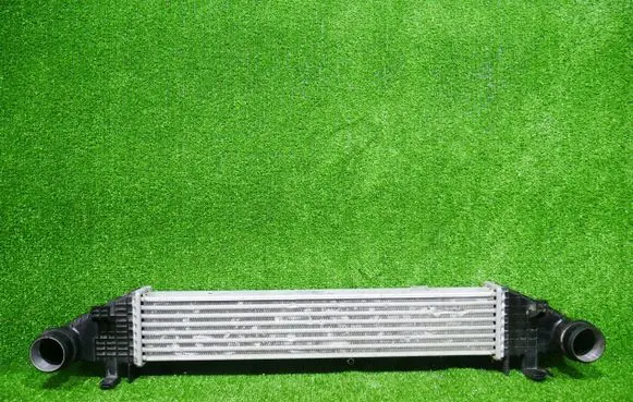 Opel Astra J Intercooler radiator 8ML376777