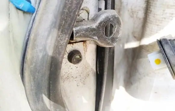 Mazda 3 I Rear door check strap stopper