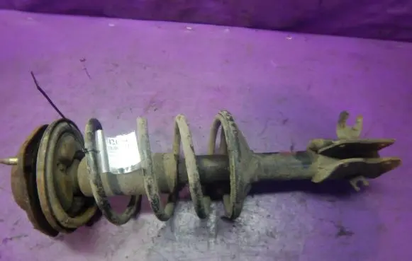 Mitsubishi Lancer Front shock absorber with coil spring