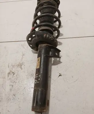 Volkswagen Caddy Front shock absorber with coil spring 1T0413031HQ