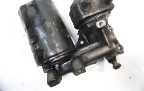 Renault Laguna I Oil filter mounting bracket 7700858578