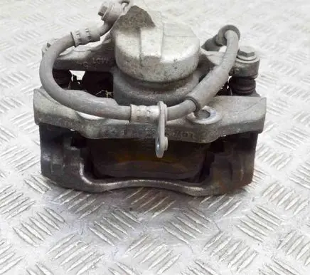 Opel Corsa F Front brake caliper 9824176580