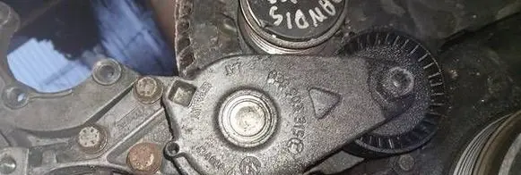 Generator/alternator belt tensioner