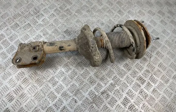 Subaru Outback Front shock absorber with coil spring