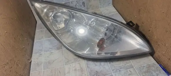 Mitsubishi Colt Headlight/headlamp MR957354 0301208202