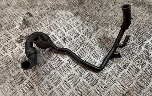 Volkswagen Golf VII Engine coolant pipe/hose 04L121064AQ