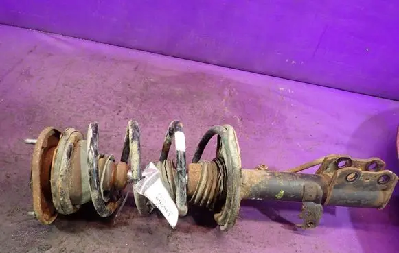 Toyota Corolla E120 E130 Front shock absorber with coil spring