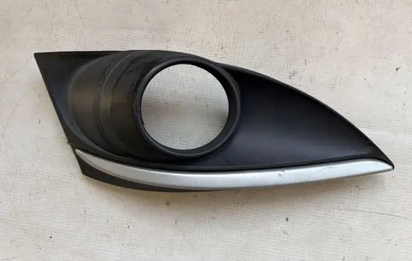 Mazda 6 Front fog light trim/grill GDK550013