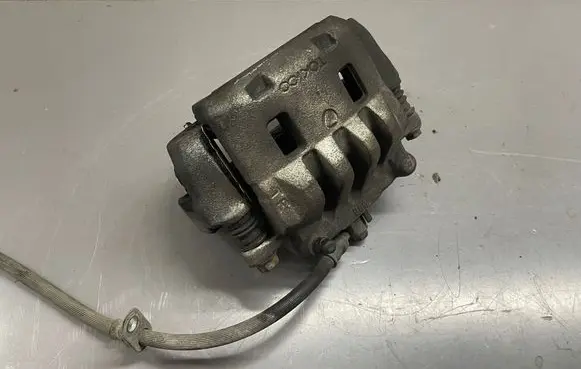 Subaru Legacy Front brake caliper 