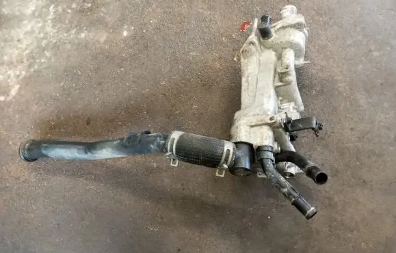 Thermostat/thermostat housing