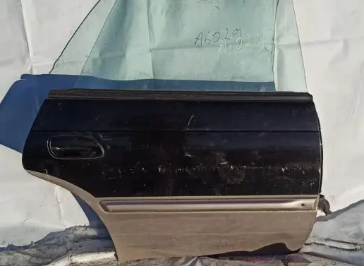 Subaru Outback Rear door Juoda