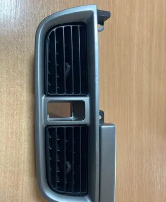 Subaru Impreza II Dash center air vent grill S16405830 E5615161100