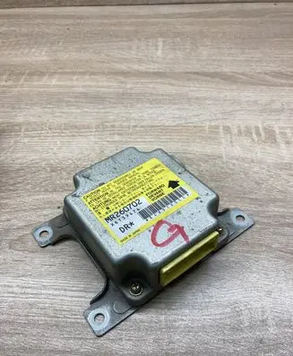 Mitsubishi Lancer Airbag control unit/module MR260702 X6T39474