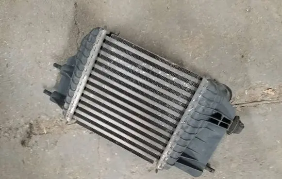 Nissan Note (E12) Intercooler radiator 144613VD0A