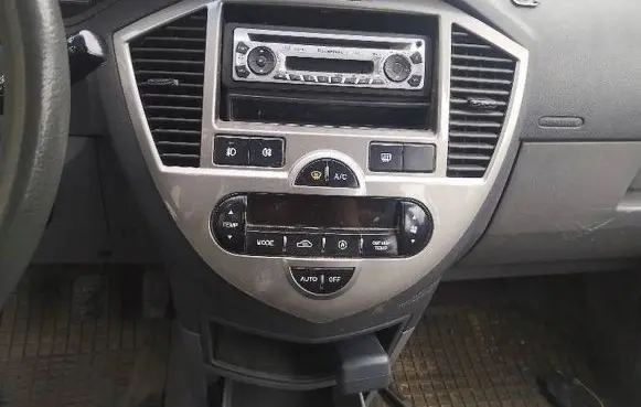 KIA Carens I Dash center air vent grill OK2FB6190