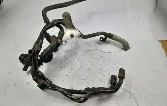 Volkswagen Touareg II Engine coolant pipe/hose 7P0121065G 7D0121605 7P02070F
