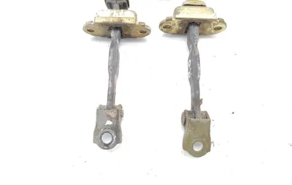 Nissan Almera Tino Front door check strap stopper