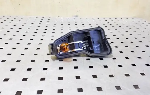 Nissan Qashqai Tail light bulb cover holder