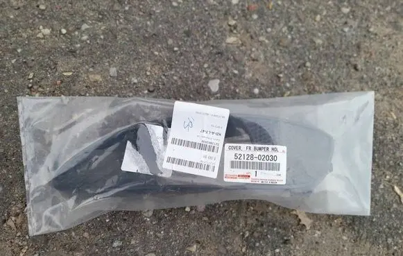 Toyota Corolla E120 E130 Front fog light trim/grill 5212802030