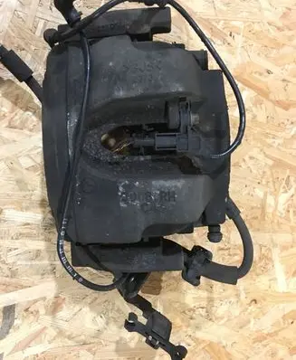 Mercedes-Benz GL X166 Front brake caliper A1664210481