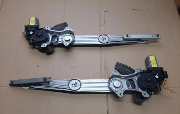 Nissan Micra Front door window regulator with motor