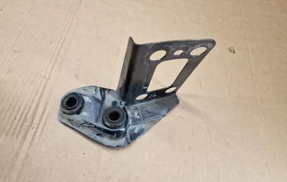 Radiator support slam panel bracket
