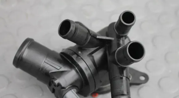 Thermostat/thermostat housing