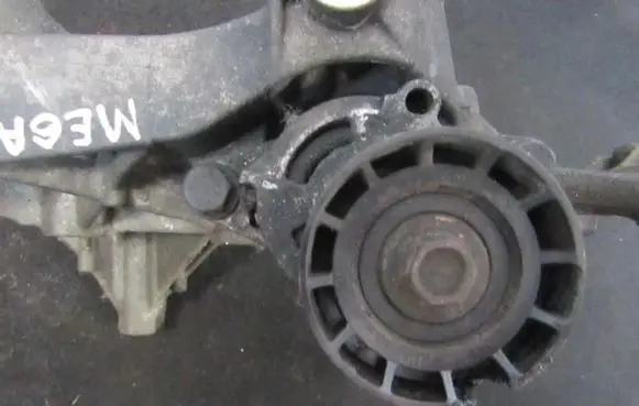 Renault Megane I Generator/alternator belt tensioner 7700102872