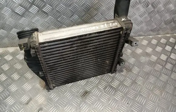 Volkswagen Touareg I Intercooler radiator