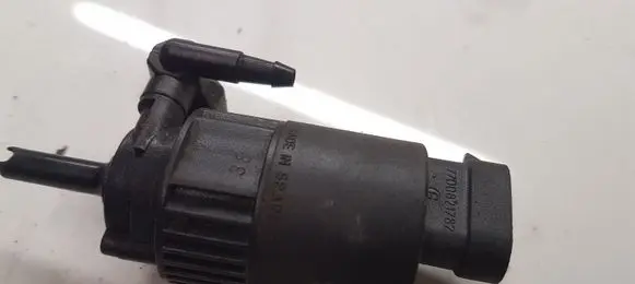 Renault Twingo I Windscreen/windshield washer pump 7700821782