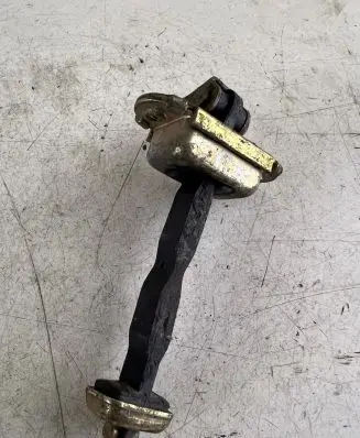Nissan Almera Tino Front door check strap stopper