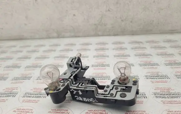 Volkswagen Touareg I Tail light bulb cover holder 7L6945259A