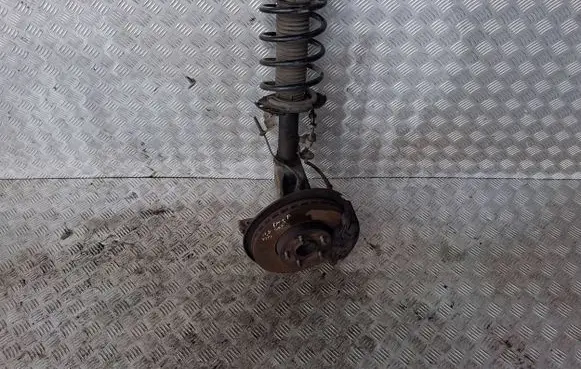 Ford Focus Front shock absorber with coil spring BV6118045LBB E5632602