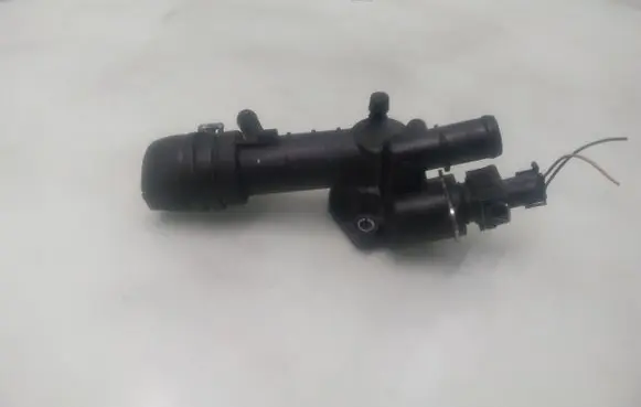 Thermostat/thermostat housing