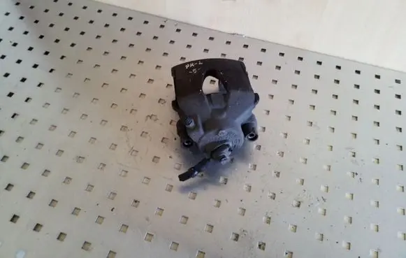Volkswagen Golf V Front brake caliper