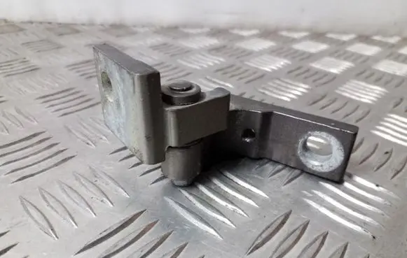 Rear door upper hinge