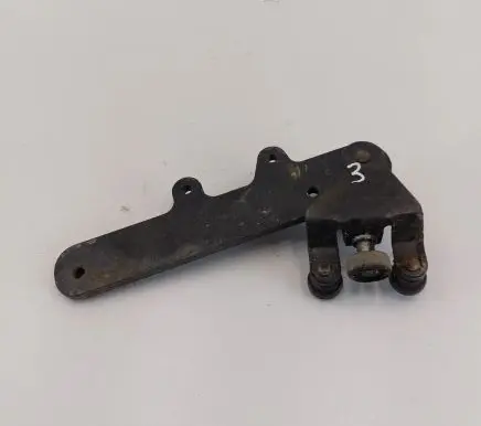 Fiat Doblo Sliding door lower roller guide/hinge 51919828