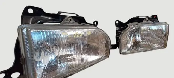 Mazda 121 Headlights/headlamps set 11061238L 11061238R