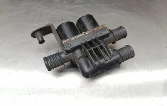 Coolant heater control valve