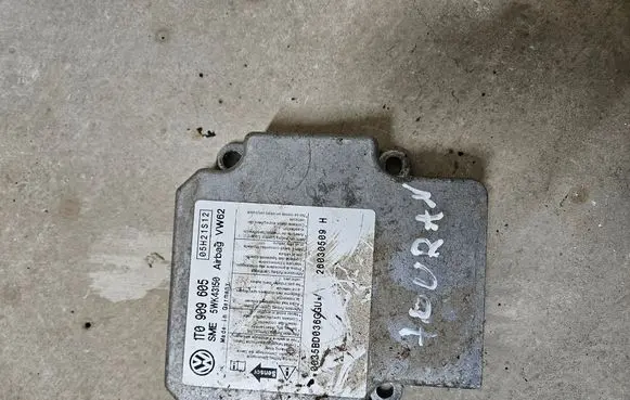Volkswagen Touran I Airbag control unit/module 1T0909605