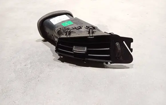Opel Astra J Dash center air vent grill 13300574