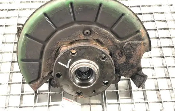 Volkswagen Touran I Front wheel hub spindle knuckle