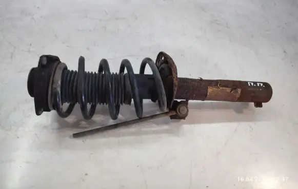 Volkswagen Touran I Front shock absorber with coil spring 1K0400054GF