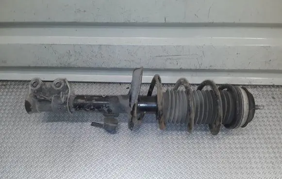 Opel Corsa D Front shock absorber with coil spring 