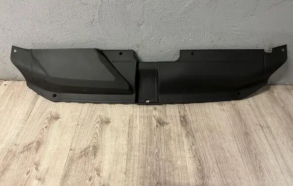 Engine bonnet/hood lock trim molding