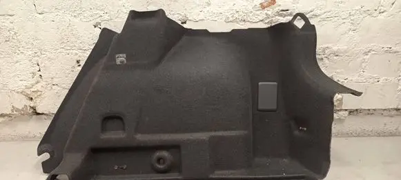 Trunk/boot lower side trim panel