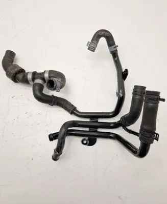 Volkswagen Golf VII Engine coolant pipe/hose 04L121064G 04L121101